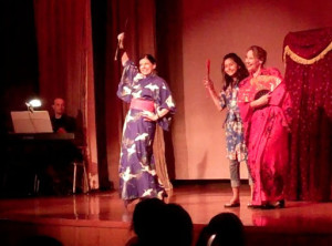 Three Little Maids performance on stage women in kimonos with fans